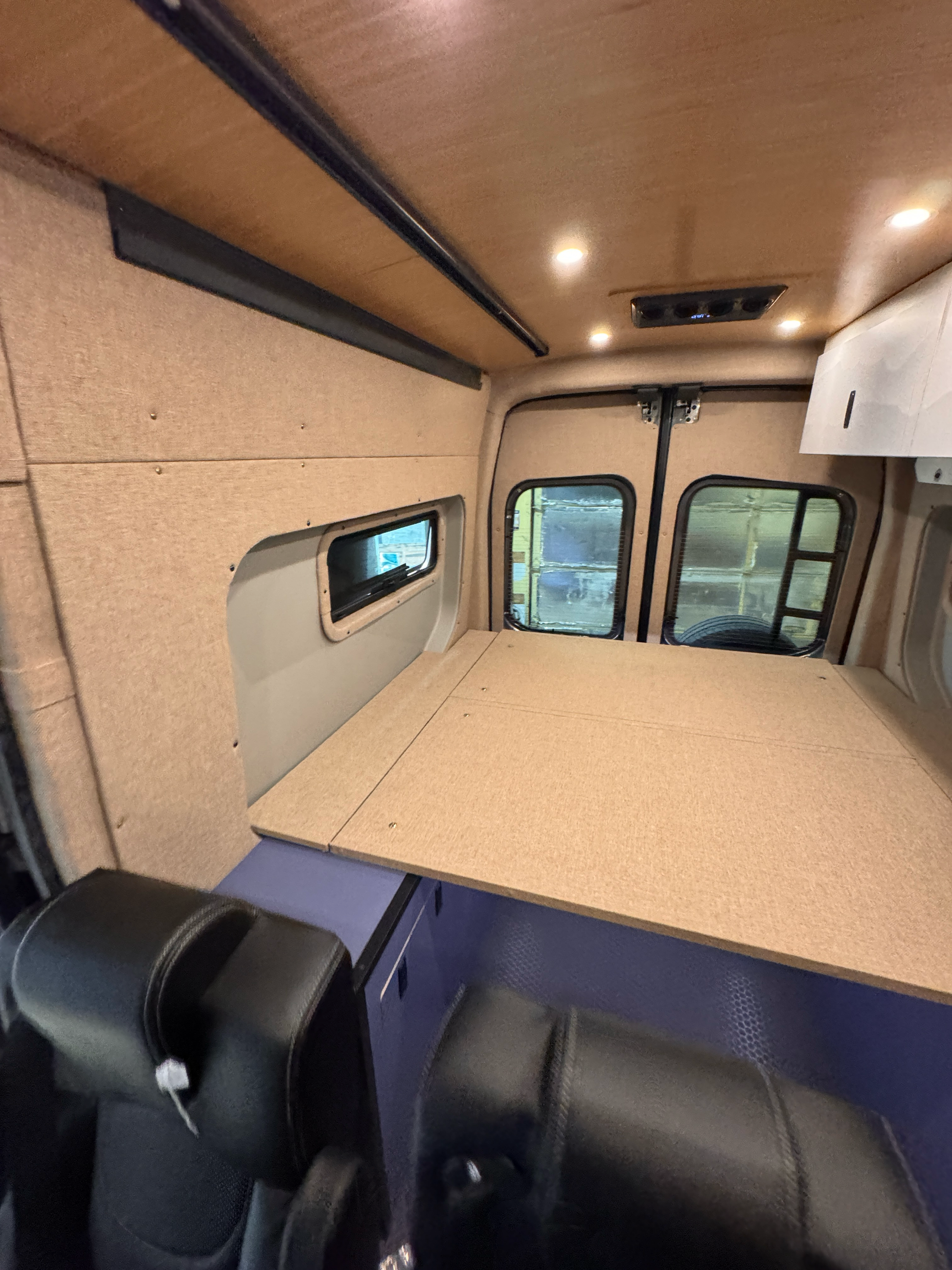 Ford Transit Innie Sleeper: Passenger-Side - 4 Wheel Overland