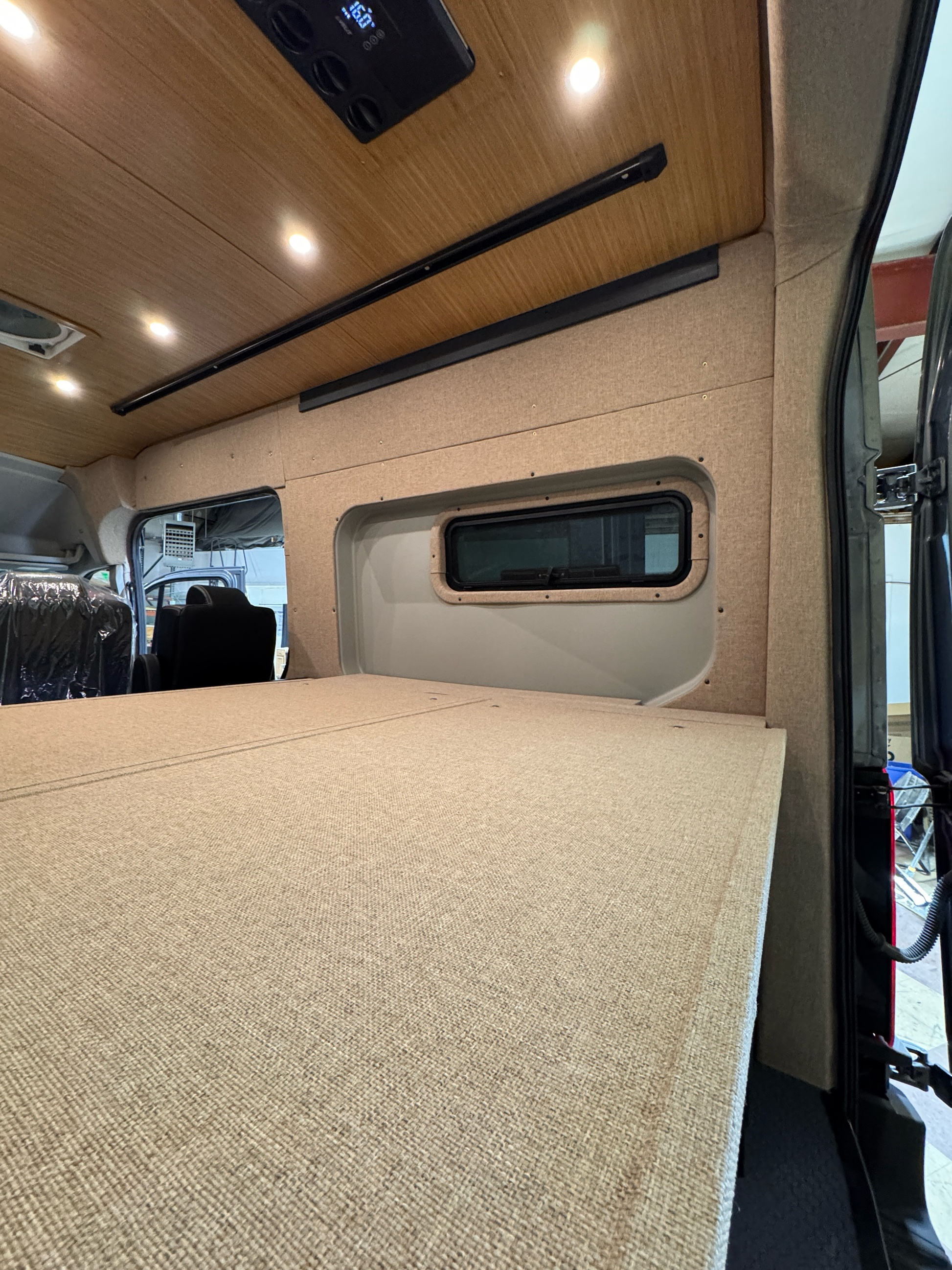 Ford Transit Innie Sleeper: Passenger-Side - 4 Wheel Overland